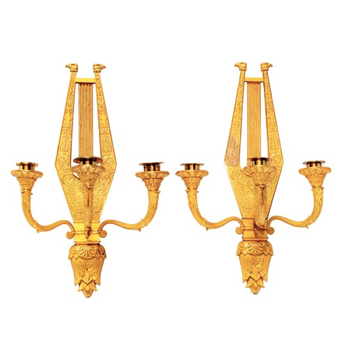 A Pair of Empire Gilt-Bronze Three-Branch Wall-Lights in the shape of a lyre.